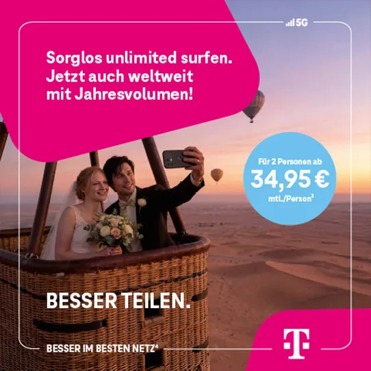 Paar im Heißluftballon macht Selfie; Telekom 5G Unlimited weltweit teilen.